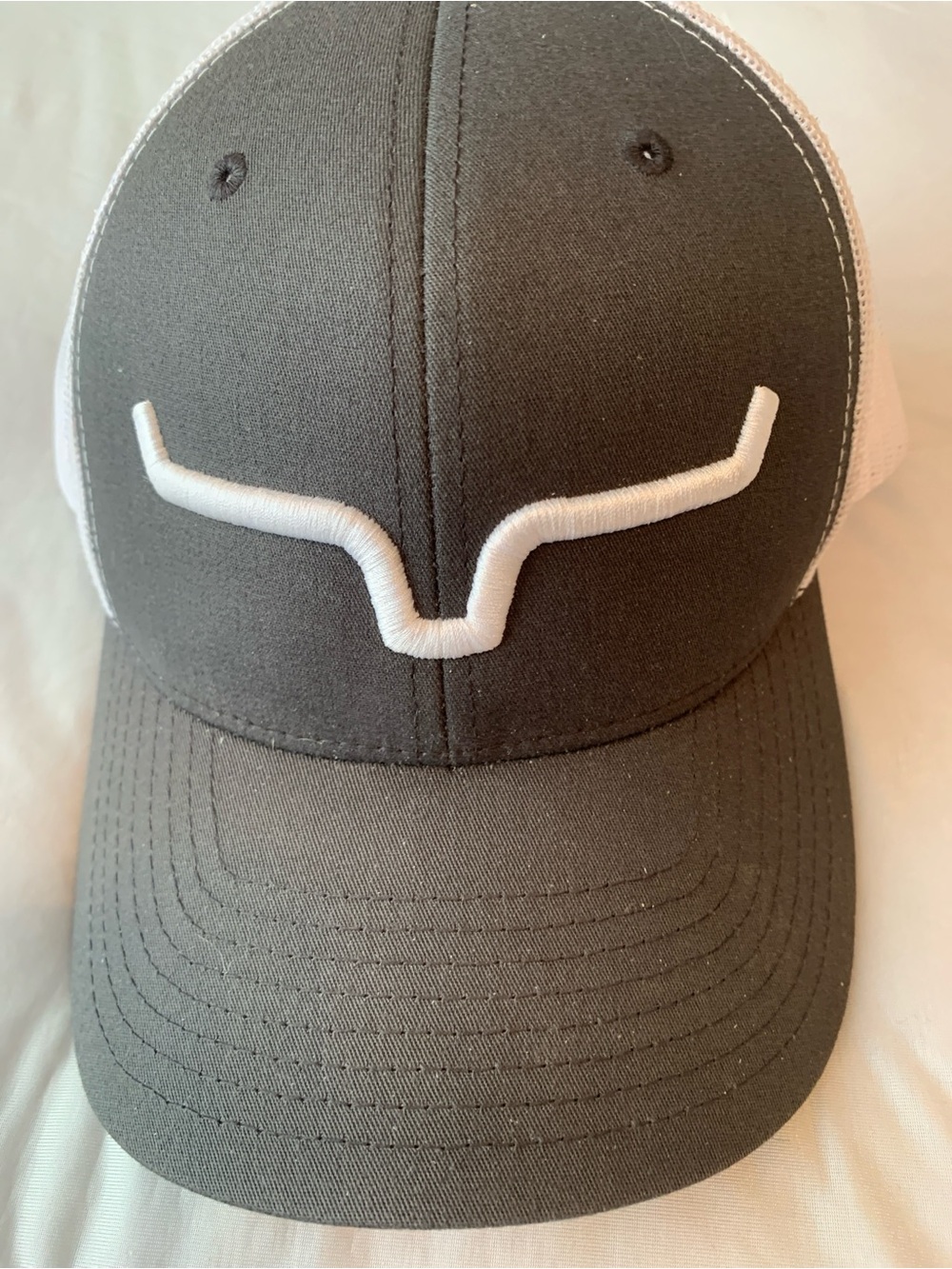 The Classic Dark Gray and White Trucker Cap with Embroidered Accent